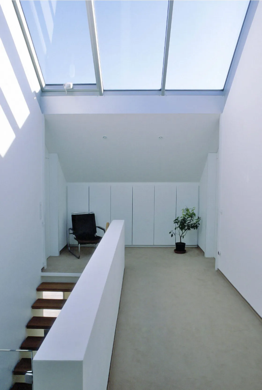 Treppenauge und Galerie im Obergeschoss
